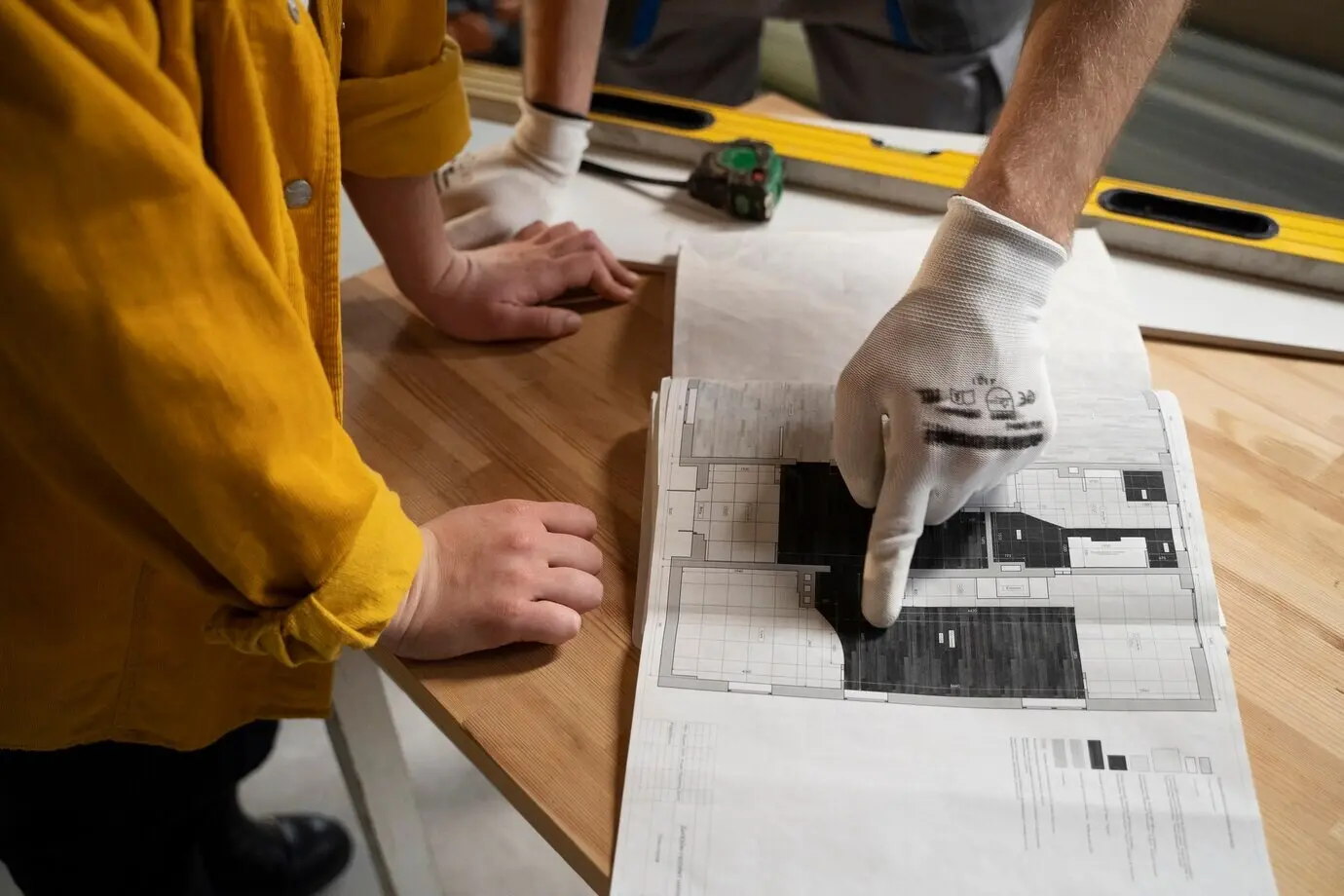 A tiler at work on an apartment renovation.